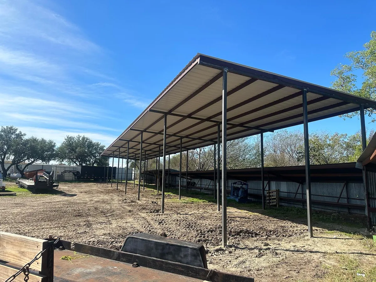 Graded dirt pad under a new steel carport, site preparation